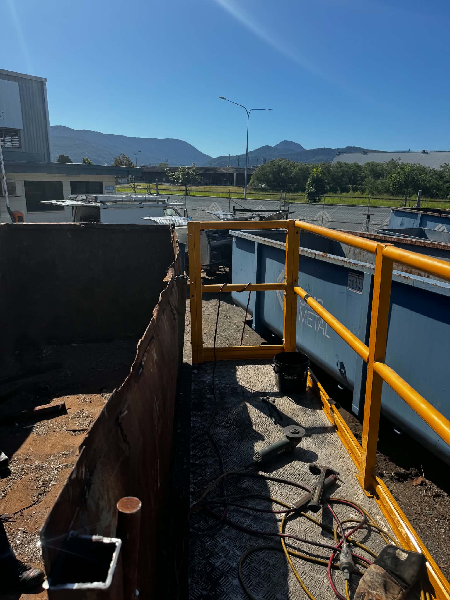 Work platform and handrails